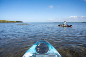 kayaker fishing on the gulf of mexico near crystal river, florida.